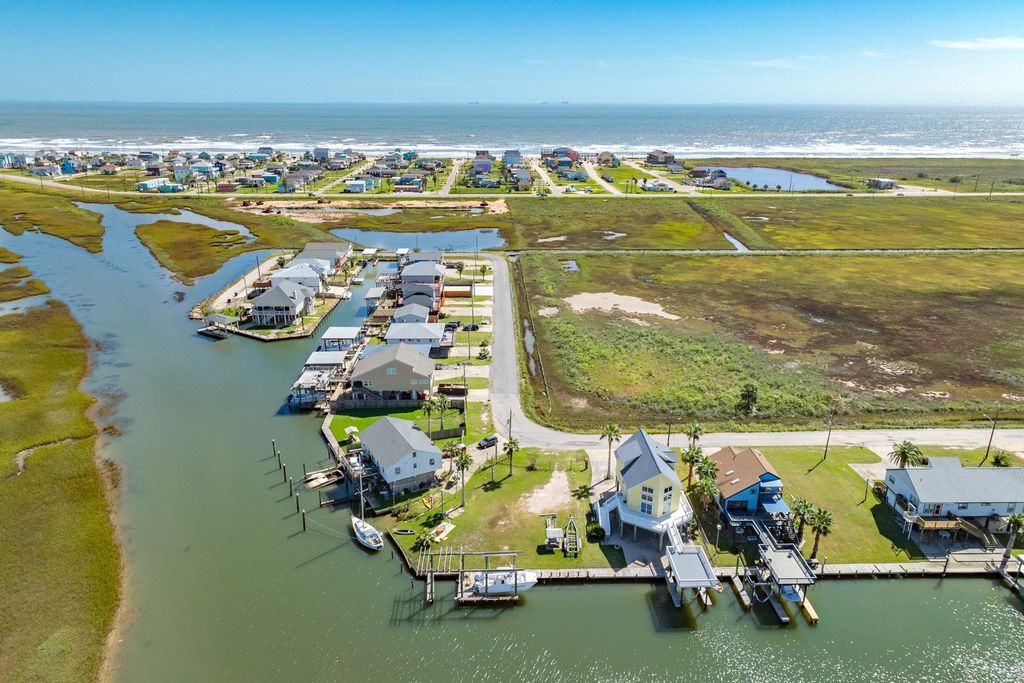 Photo of 431 Swordfish Lane, Surfside Beach, TX 77541 (MLS # 85570032)