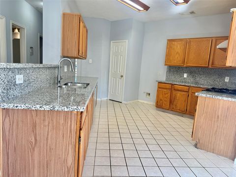Photo of 8819 Diamond Lake Lane, Houston, TX 77083 (MLS # 96264395)