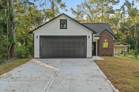Photo of 2442 Mohawk Bend, Willis, TX 77378 (MLS # 42294285)
