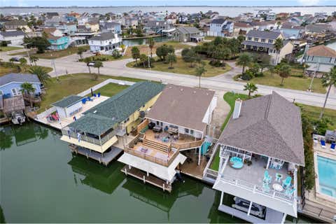 Photo of 1114 Tiki Dr Drive, Tiki Island, TX 77554 (MLS # 58258268)