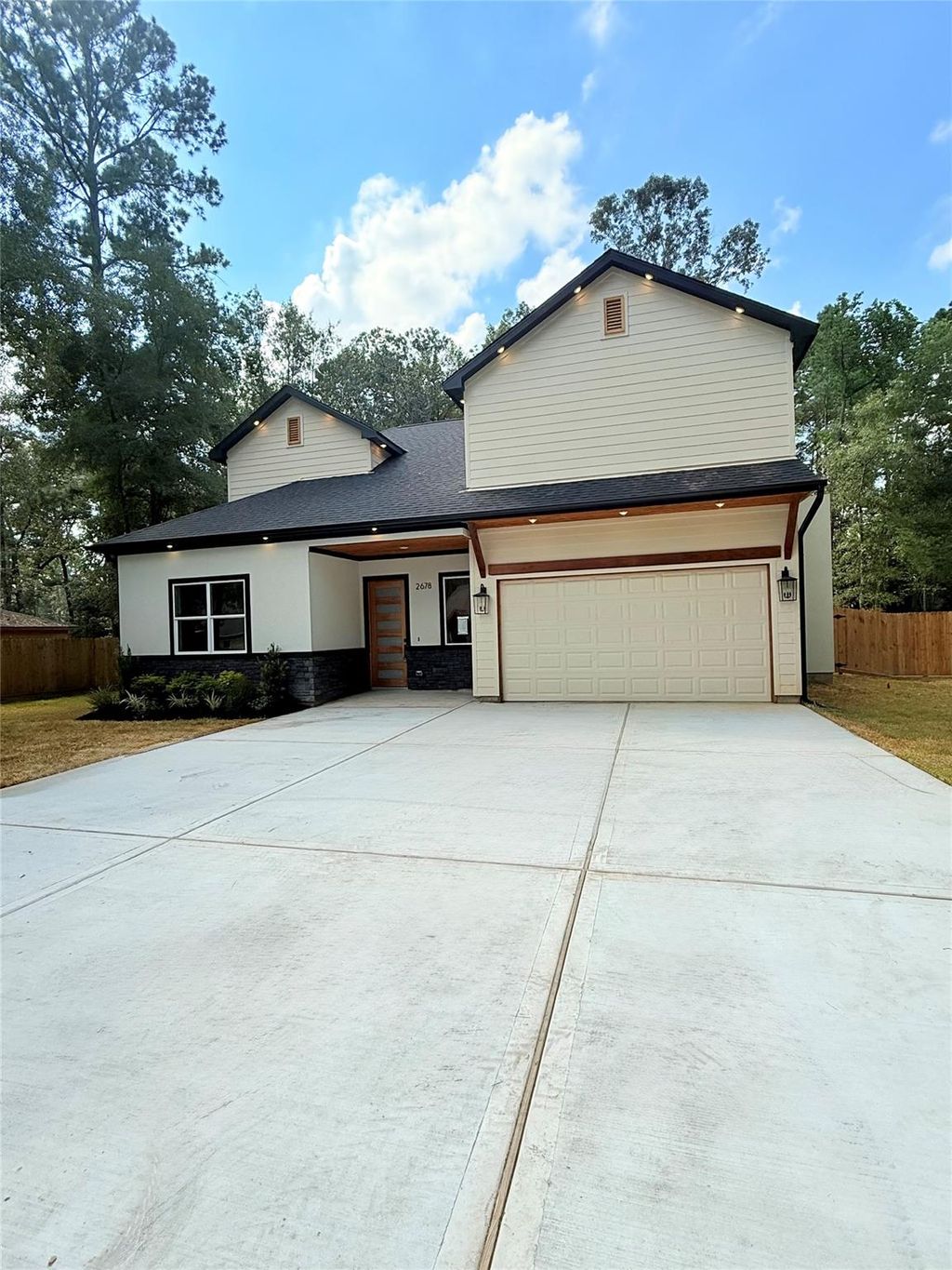 Photo of 2678 Colosseum Ct, New Caney, TX 77357 (MLS # 54962367)