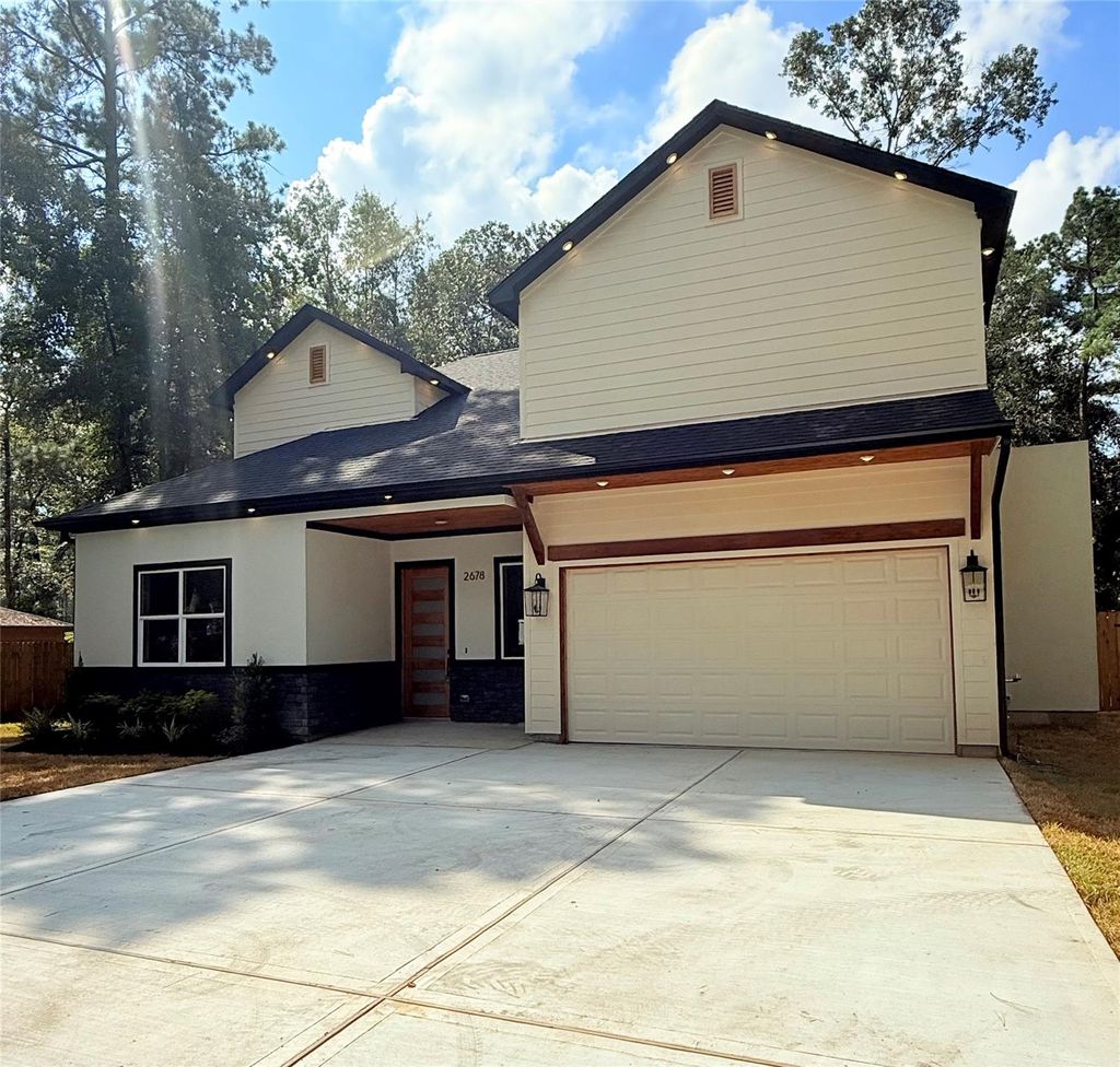 Photo of 2678 Colosseum Ct, New Caney, TX 77357 (MLS # 54962367)