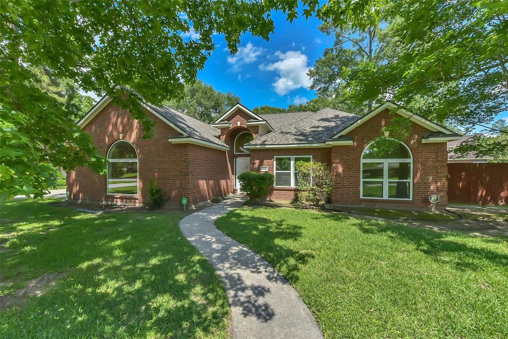 Photo of 406 Caesars Circle, New Caney, TX 77357 (MLS # 82981868)