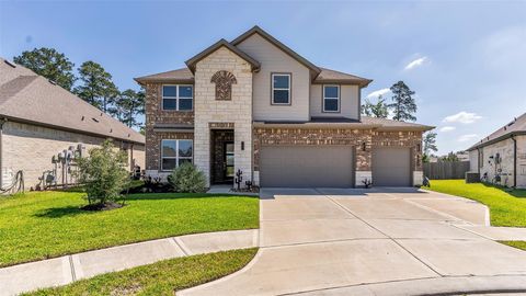 Photo of 10302 Horseshoe Lake Trail, Conroe, TX 77384 (MLS # 59627506)