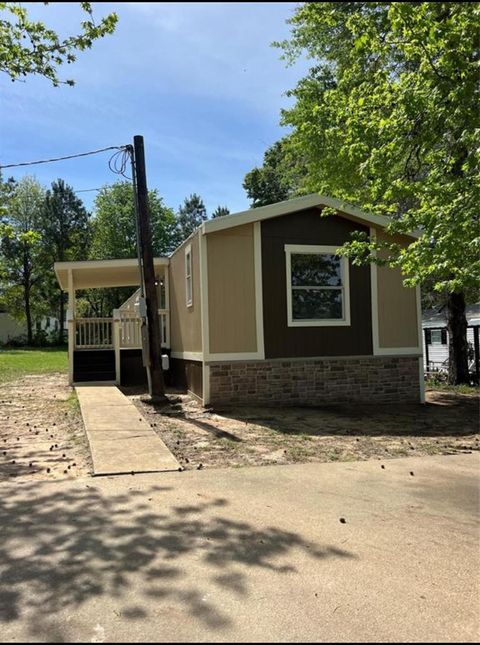 Photo of 107 Earl Road, Huntsville, TX 77320 (MLS # 64861492)