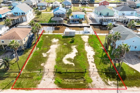 Photo of 402 Shark Lane, Surfside Beach, TX 77541 (MLS # 80826623)