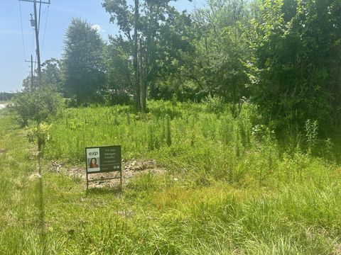 Photo of 20455 Lazy Creek Drive, New Caney, TX 77357 (MLS # 87916139)