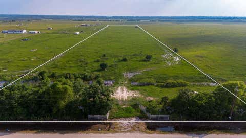 Photo of TBD Hughes Road, Guy, TX 77444 (MLS # 20069734)