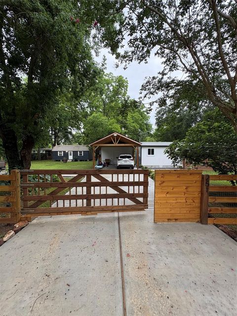 Photo of 251 Mudd Street, Coldspring, TX 77331 (MLS # 52668262)
