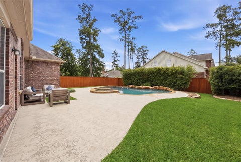 Photo of 115 S Rocky Point Circle, The Woodlands, TX 77389 (MLS # 77210791)