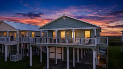 Photo of 2927 Blue Water Highway, Surfside Beach, TX 77541 (MLS # 88893499)