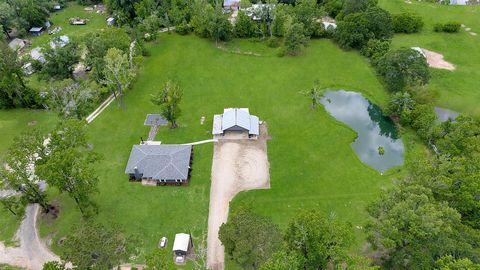 Photo of 10792 Stidham Road, Conroe, TX 77302 (MLS # 87403230)