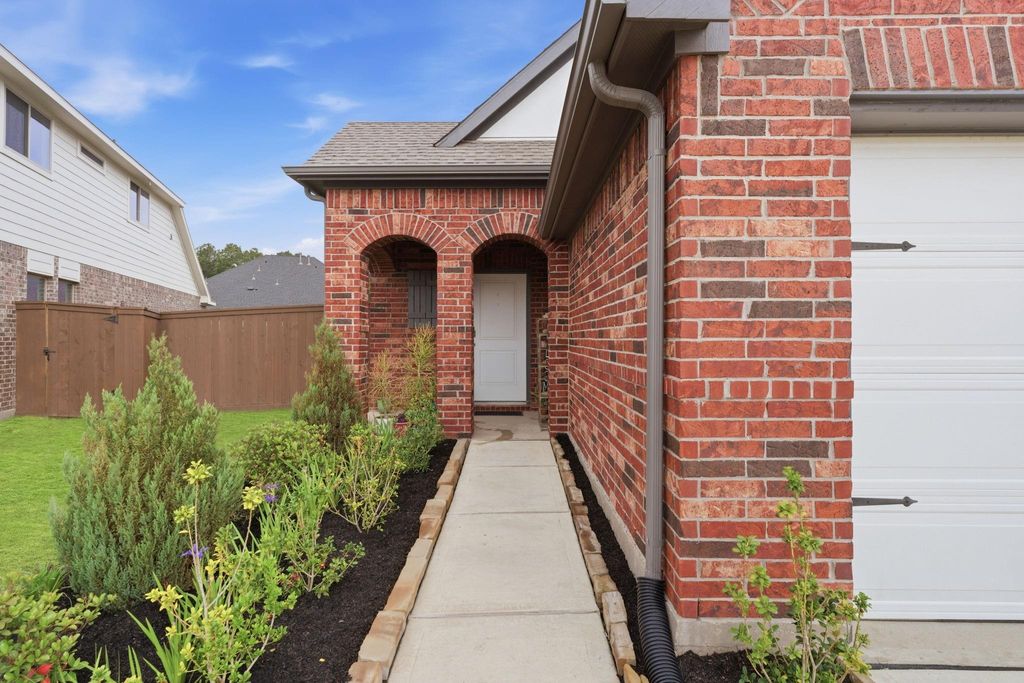 Photo of 313 Violet Crown Lane, New Caney, TX 77357 (MLS # 85974778)