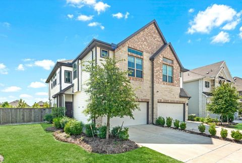 Photo of 15046 Flintstone Village Trail, Cypress, TX 77433 (MLS # 82421065)