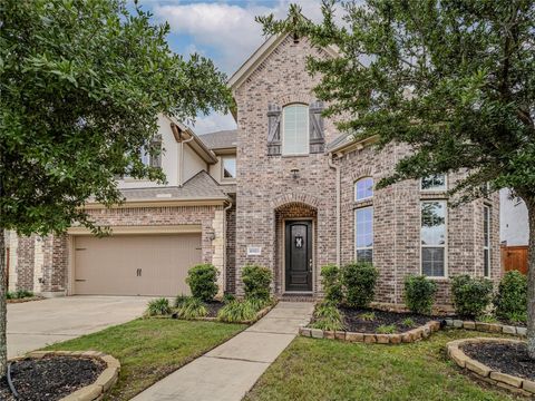 Photo of 10923 Sunnydale Ridge Lane, Cypress, TX 77433 (MLS # 36188439)
