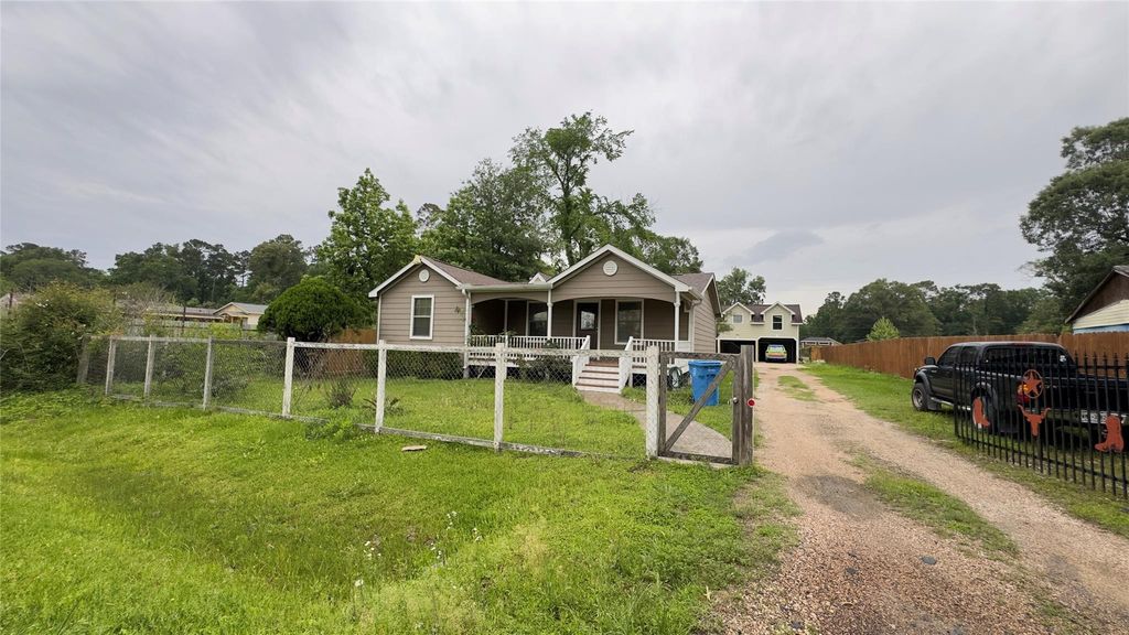 Photo of 21253 South St St, New Caney, TX 77357 (MLS # 21399911)