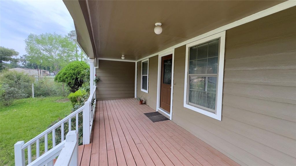 Photo of 21253 South St St, New Caney, TX 77357 (MLS # 21399911)