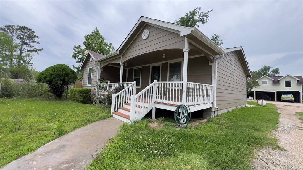 Photo of 21253 South St St, New Caney, TX 77357 (MLS # 21399911)