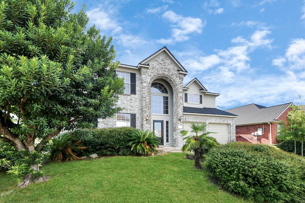 Photo of 17303 Quiet Grove Lane, Humble, TX 77346 (MLS # 48477588)