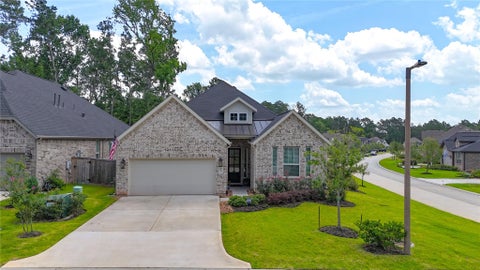 Photo of 204 Bronzewood Terrace Court, Conroe, TX 77318 (MLS # 88438885)