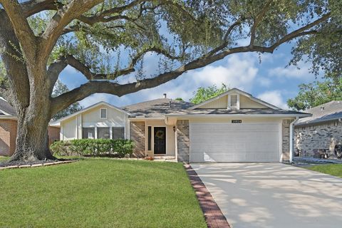 Photo of 16814 Rockbend, Houston, TX 77084 (MLS # 20916914)