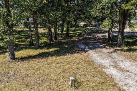 Photo of 15 Creek Point PT, Huntsville, TX 77320 (MLS # 52504527)