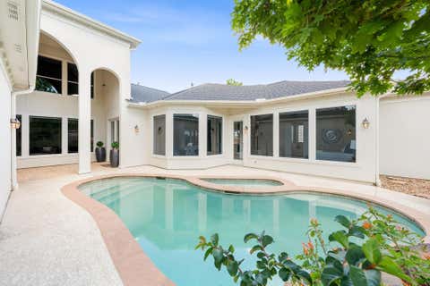 Photo of 70 Blooming Grove Lane, Houston, TX 77077 (MLS # 23286889)