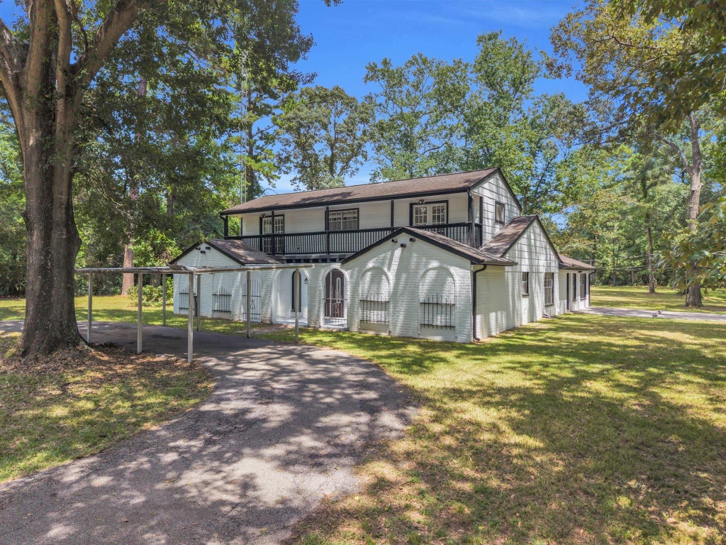 Photo of 33102 Rollingwood Drive, Pinehurst, TX 77362 (MLS # 74819626)