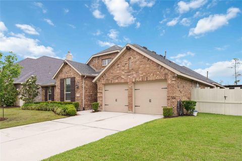 Photo of 10127 Coopers Hawk Way, Conroe, TX 77385 (MLS # 26564814)