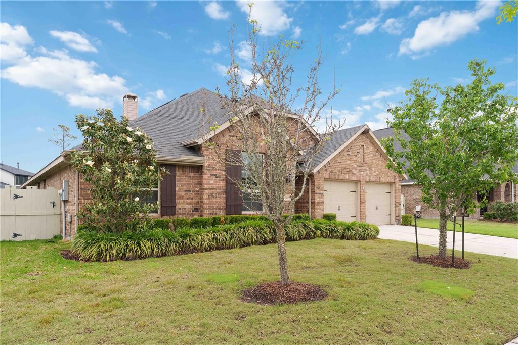 Photo of 10127 Coopers Hawk Way, Conroe, TX 77385 (MLS # 26564814)