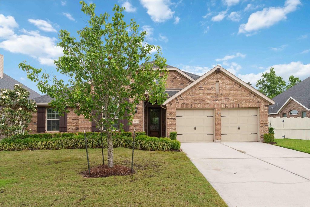 Photo of 10127 Coopers Hawk Way, Conroe, TX 77385 (MLS # 26564814)