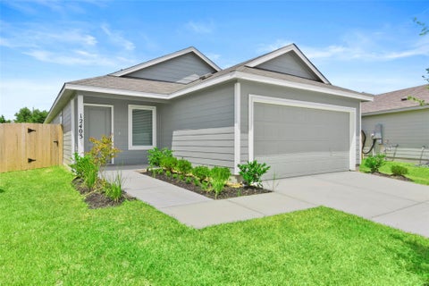Photo of 12403 Wild Strawberry Rd Rd, Houston, TX 77038 (MLS # 78829250)