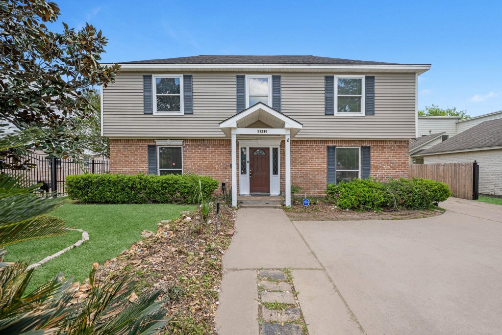 Photo of 11319 Briar Forest Drive, Houston, TX 77077 (MLS # 43460623)