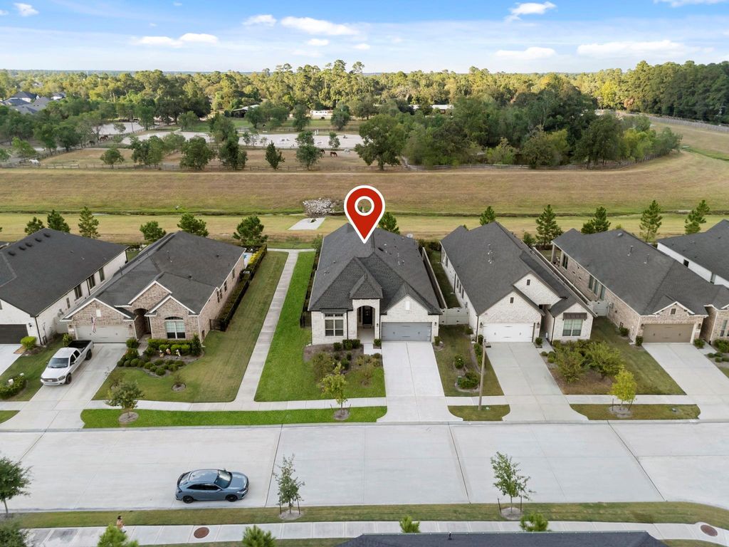 Photo of 10473 Eastern Bluestar Drive, Conroe, TX 77385 (MLS # 41840089)
