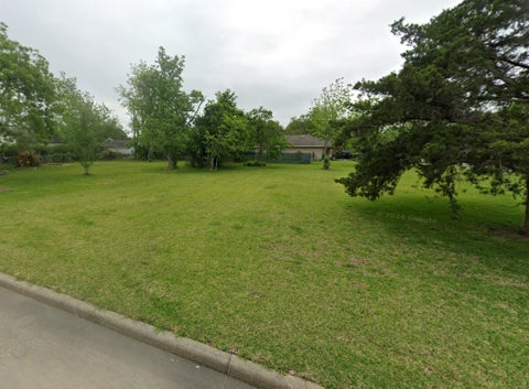 Photo of 815 Bowie Street, Baytown, TX 77520 (MLS # 86328654)