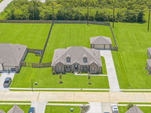 Photo of 15022 Arenosa Avenue, Mont Belvieu, TX 77523 (MLS # 81928247)