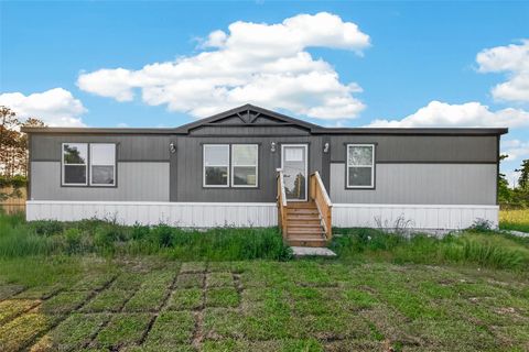 Photo of 63 Road 5012, Cleveland, TX 77327 (MLS # 67005419)