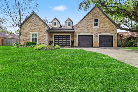 Photo of 9507 Meadowglen Lane, Houston, TX 77063 (MLS # 41109449)