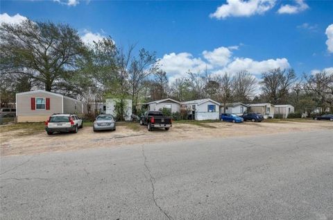 Photo of 401 S Woodson Street #7, Willis, TX 77378 (MLS # 11917666)