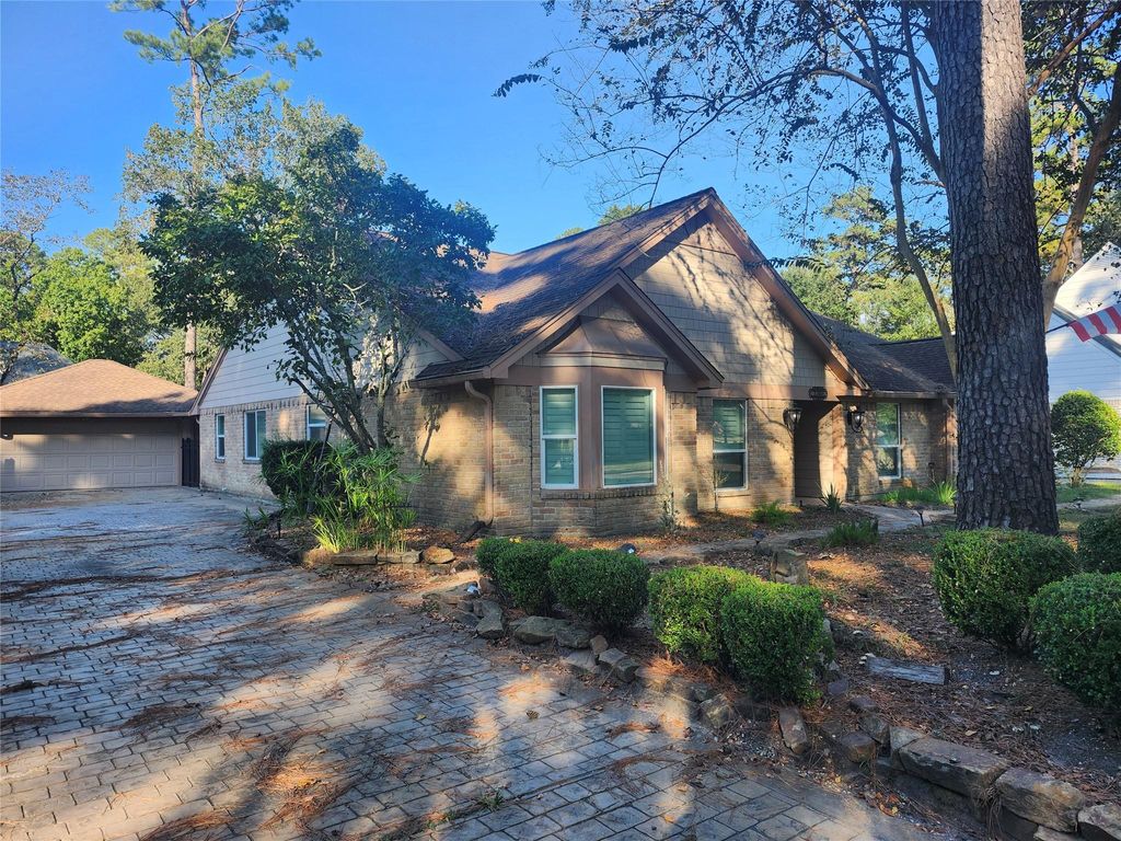 Photo of 1306 Trailwood Village Drive, Houston, TX 77339 (MLS # 91338441)