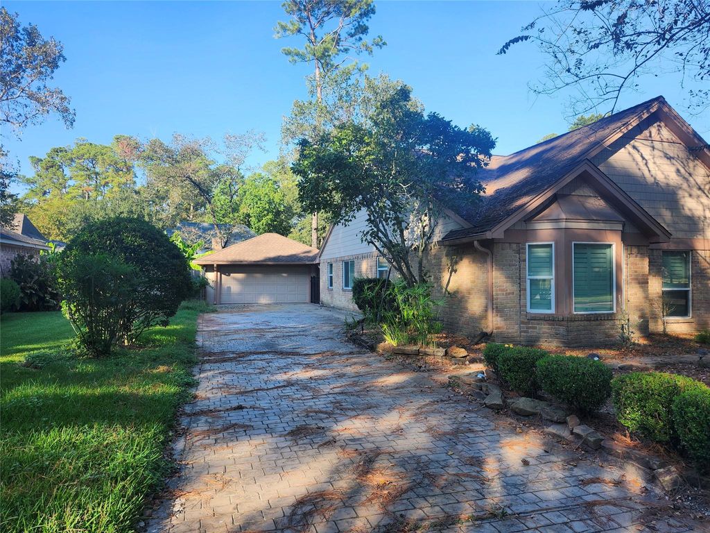 Photo of 1306 Trailwood Village Drive, Houston, TX 77339 (MLS # 91338441)