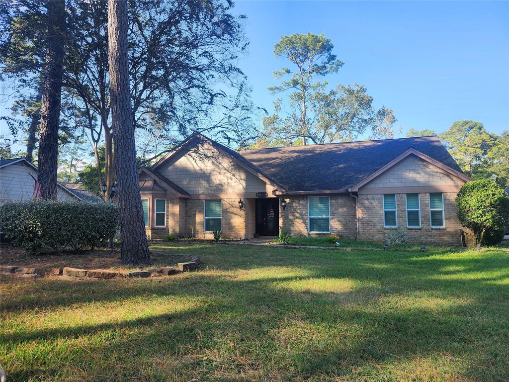 Photo of 1306 Trailwood Village Drive, Houston, TX 77339 (MLS # 91338441)