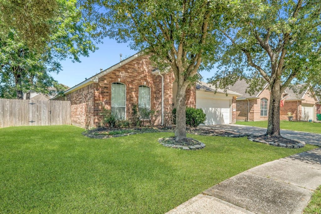 Photo of 13823 Cane Valley Court, Houston, TX 77044 (MLS # 97669277)