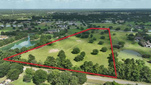 Photo of 0 Post Oak Run CT, Magnolia, TX 77355 (MLS # 59683979)