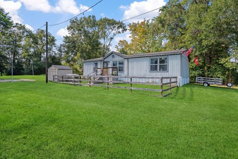 Photo of 440 River Road, Goodrich, TX 77335 (MLS # 16871932)