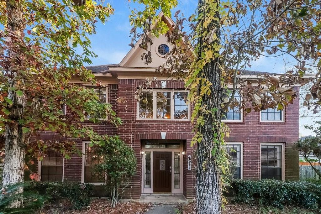 Photo of 5111 Natural Bridge Drive, Houston, TX 77345 (MLS # 83732269)