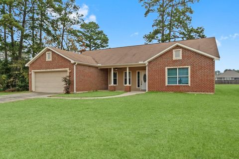 Photo of 13003 Point Aquarius Boulevard, Willis, TX 77318 (MLS # 70889132)