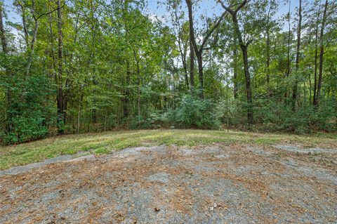 Photo of 410 North Woods, Cleveland, TX 77328 (MLS # 42948502)