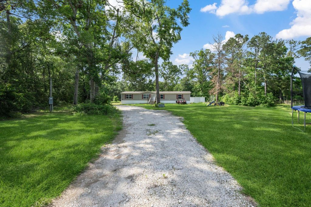 Photo of 25865 Hickory Knoll Court, Cleveland, TX 77328 (MLS # 95325813)