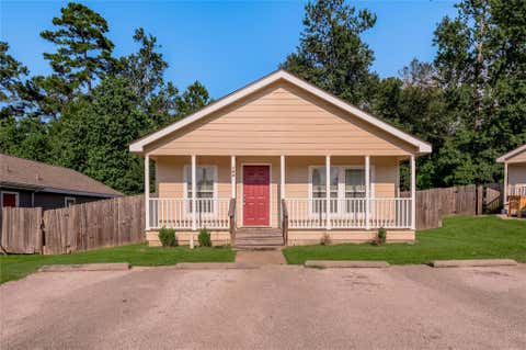 Photo of 164 Varsity Drive, Huntsville, TX 77340 (MLS # 93994816)